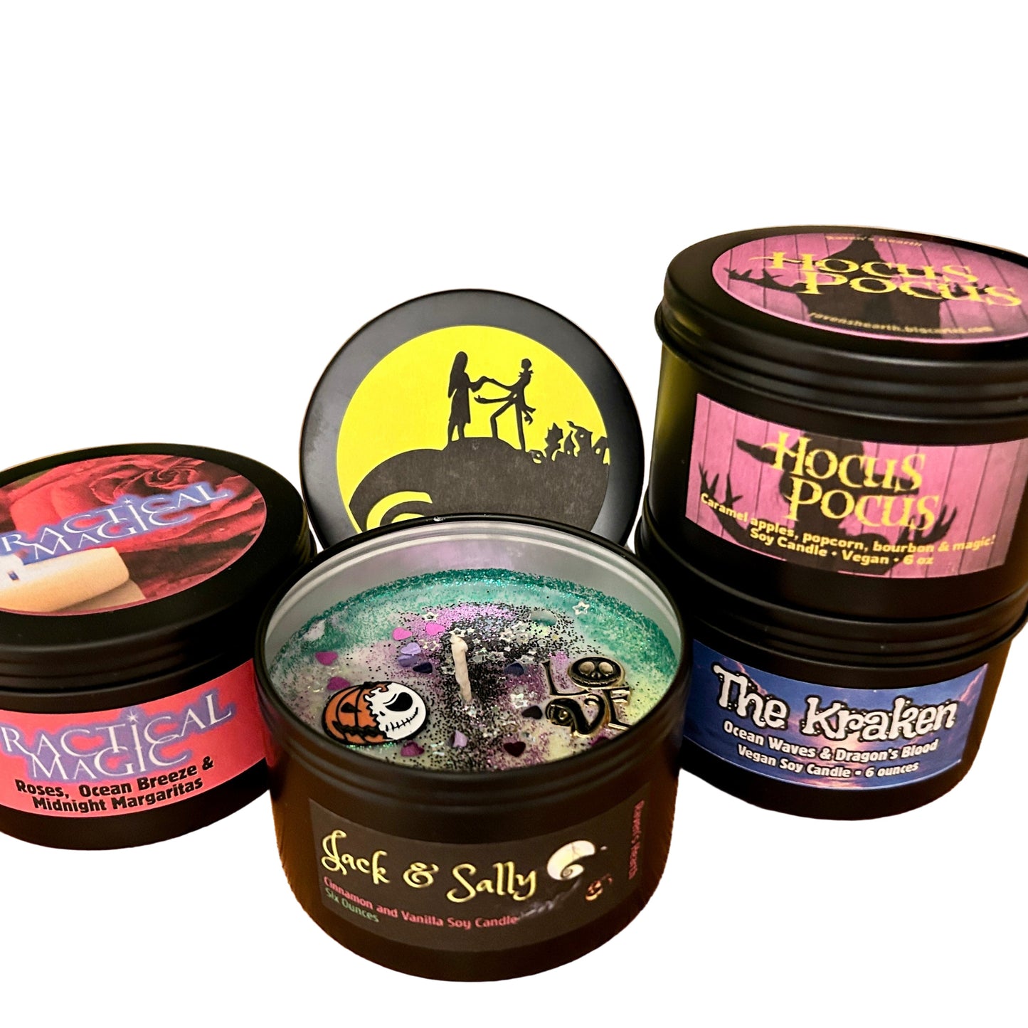 Four halloween movie themed candles with colorful labels