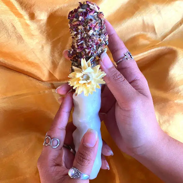 hands holding Witch Candle Holy Mullein Hag Torch