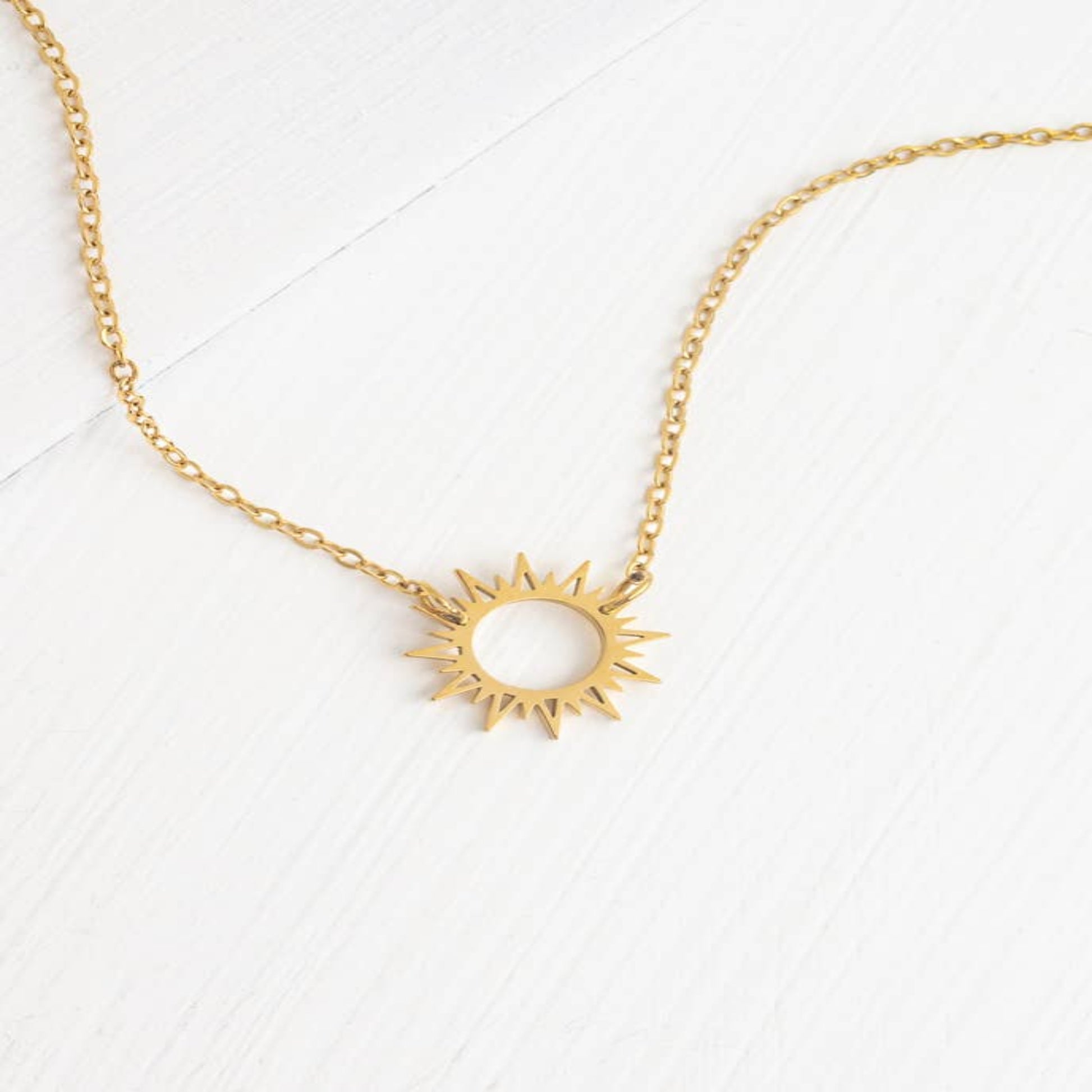 Sunburst gold plated pendant necklace