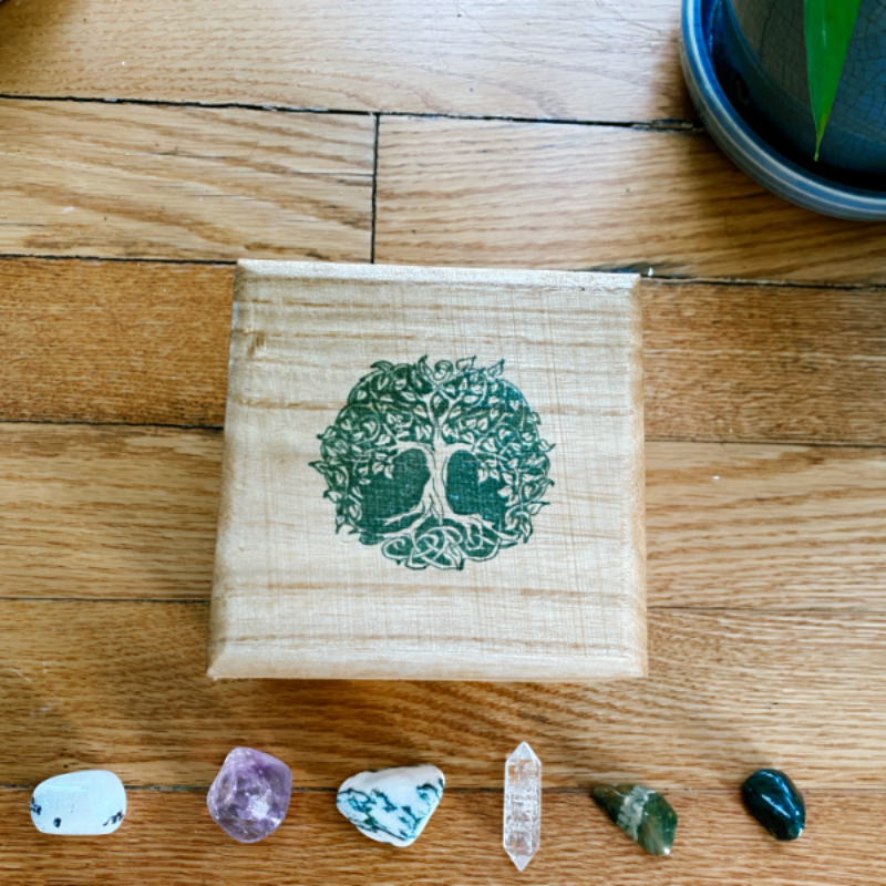 wooden box with tree of life images to store  healing crystals