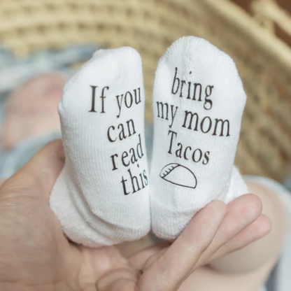 Baby socks for new parents if you can read this, bring my mom tacos