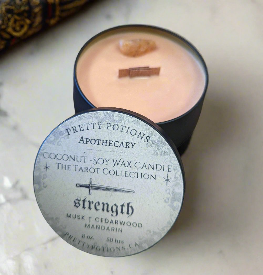 Strength tarot card candle with cedarwood and manadrin scent